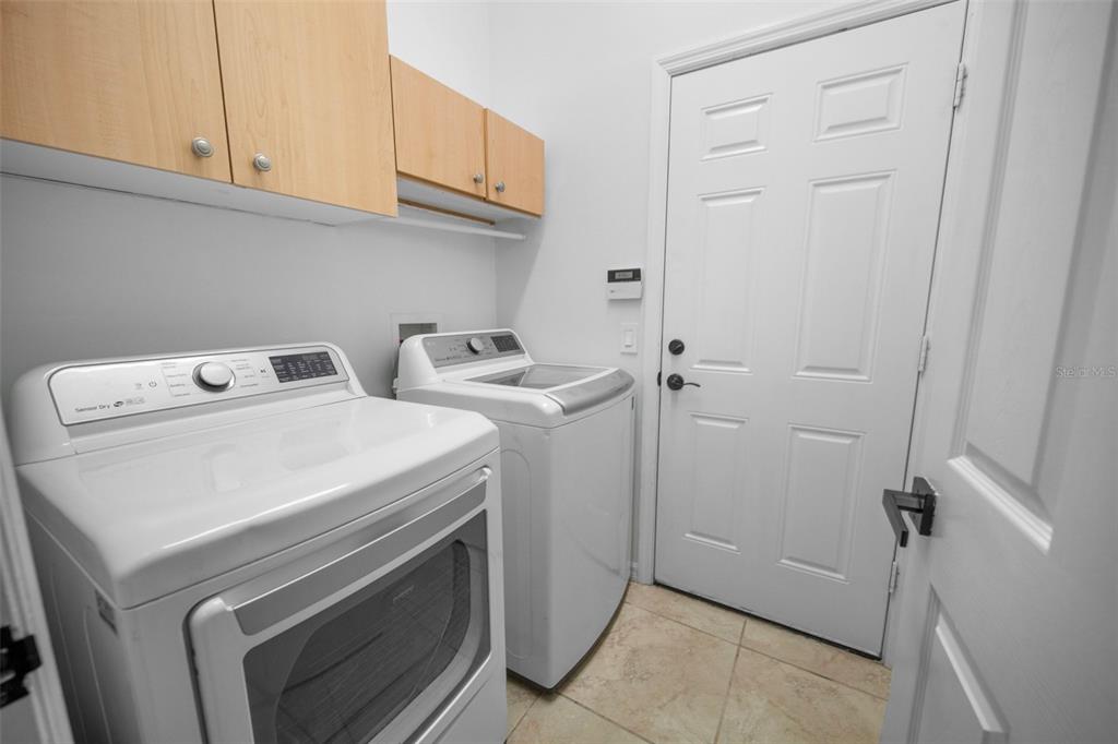 2217 Caledonian Street Clermont, FL 34711 - Photo 18 of 23 a utility room with dryer and washer