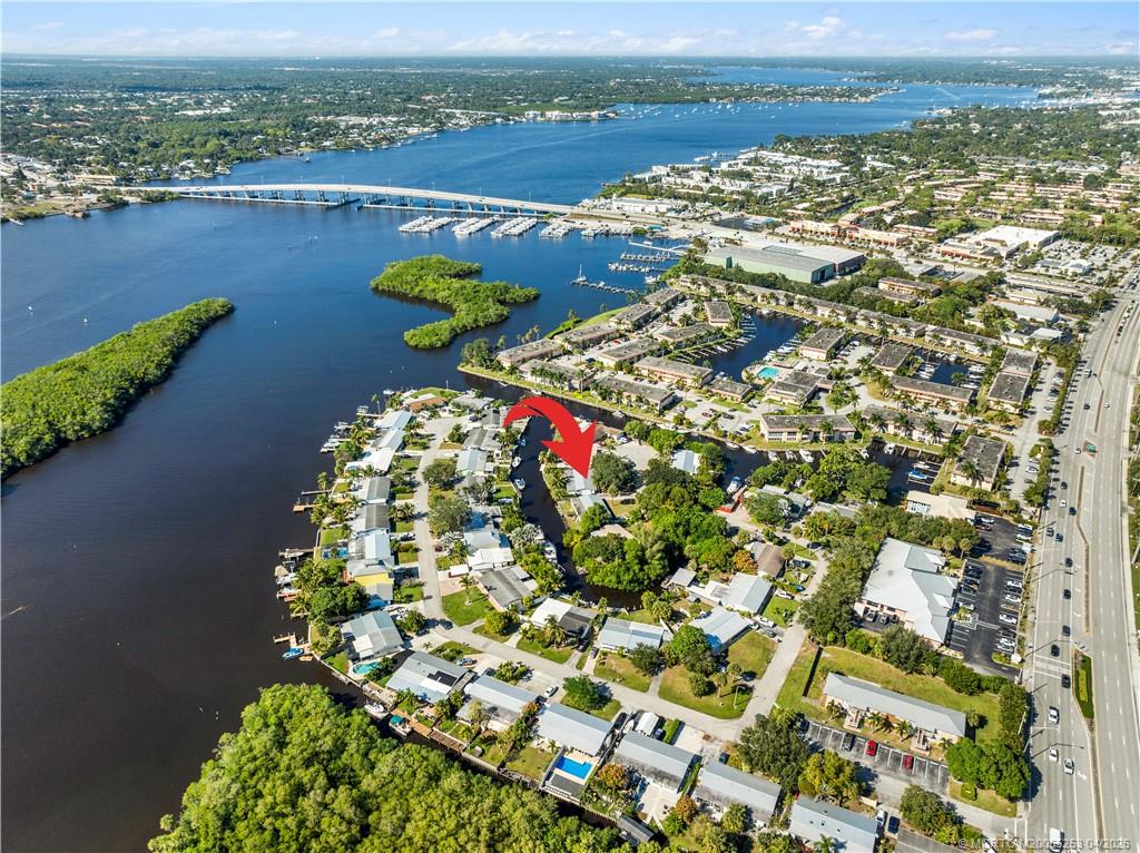 2446-2456 Southwest Hideaway Lane Stuart, FL 34994 - Photo 35 of 42 a view of lake with mountain