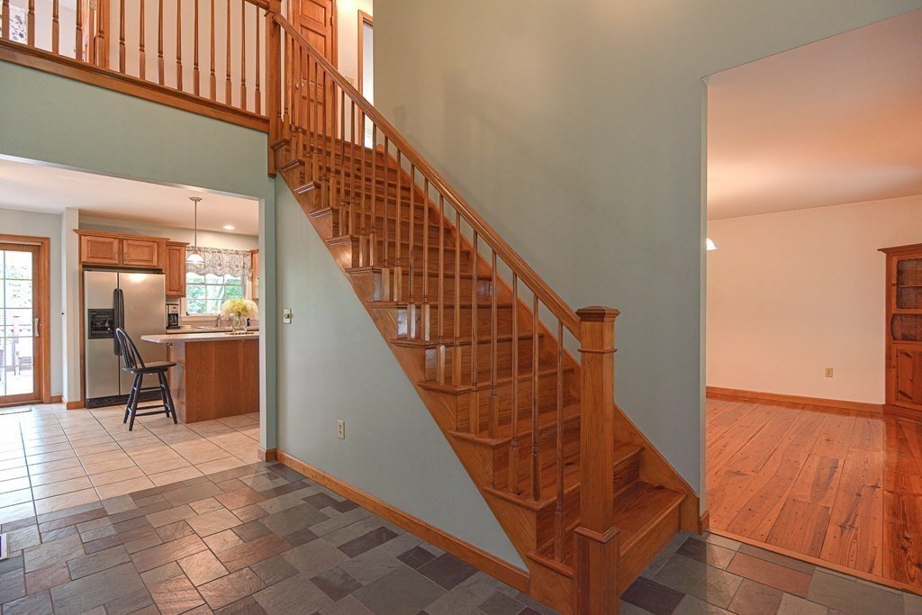 578 Reed Street Warren, MA 01092 - Photo 15 of 42 a view of entryway and hall with wooden floor