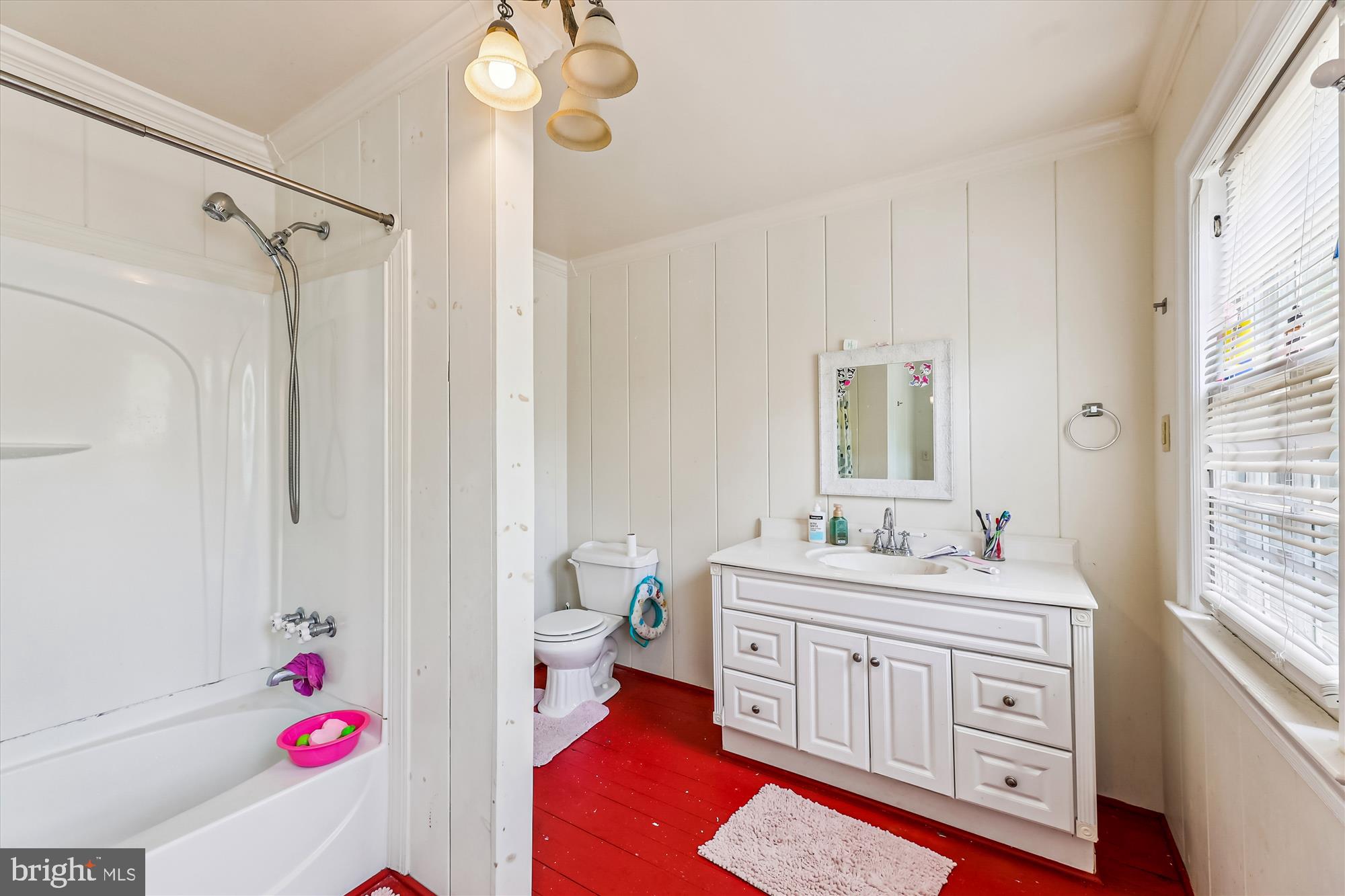 9502 Brandywine Road Clinton, MD 20735 - Photo 20 of 21 a spacious bathroom with a double vanity sink a mirror and a bathtub