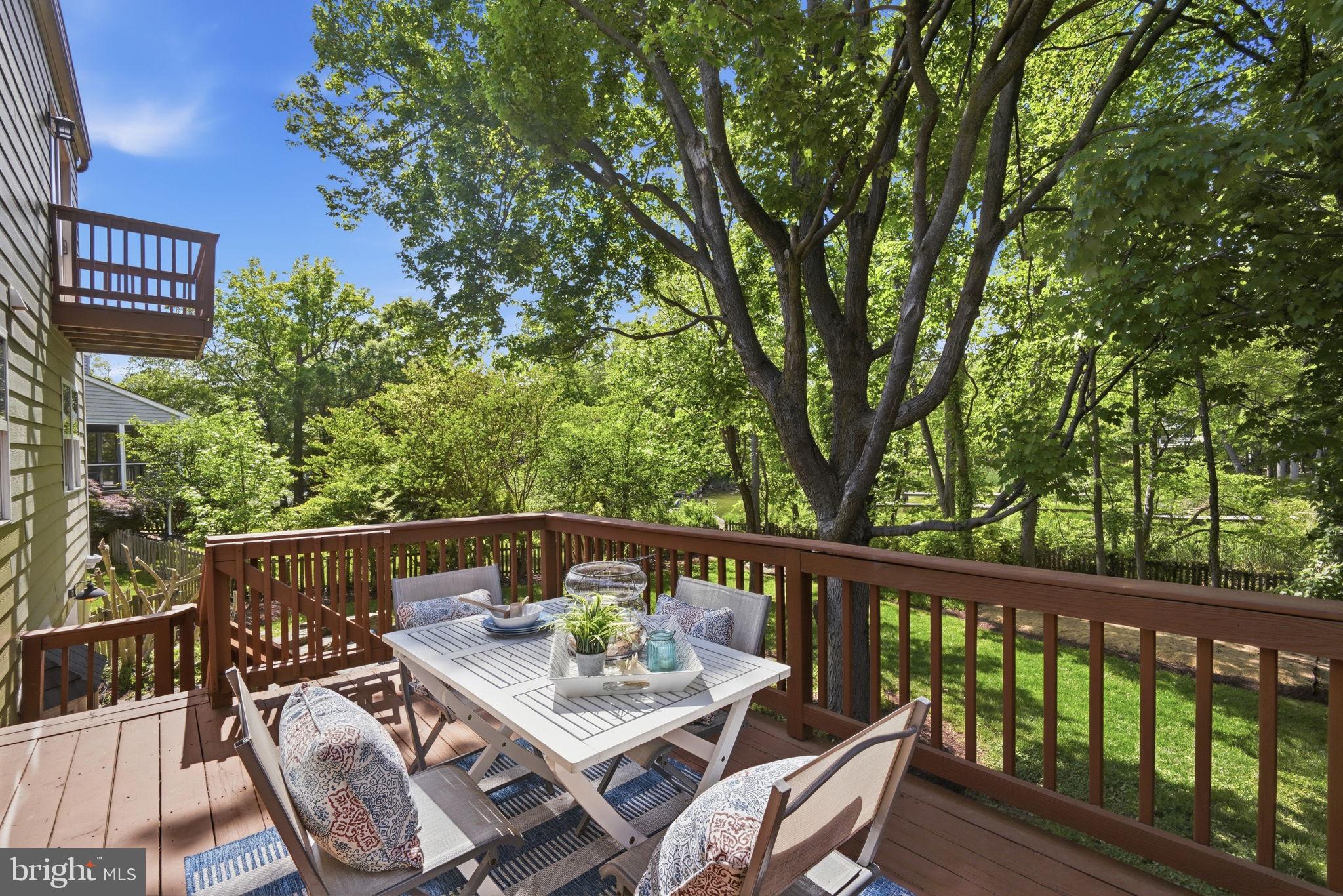 996 Headwater Road Annapolis, MD 21403 - Photo 13 of 59 Serene deck amidst lush greenery.
