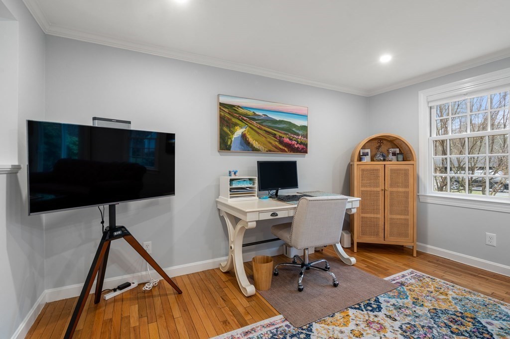 55 Jericho Road, Unit 55 Weston, MA 02493 - Photo 4 of 24 a workspace with furniture hardwood and a window