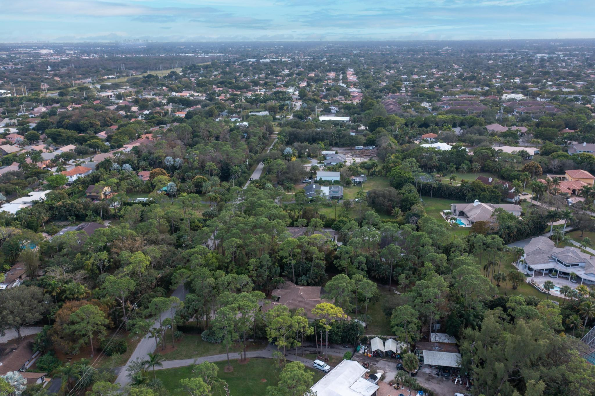 4901 Godfrey Road Parkland, FL 33067 - Photo 11 of 60 an aerial view of residential house and green space