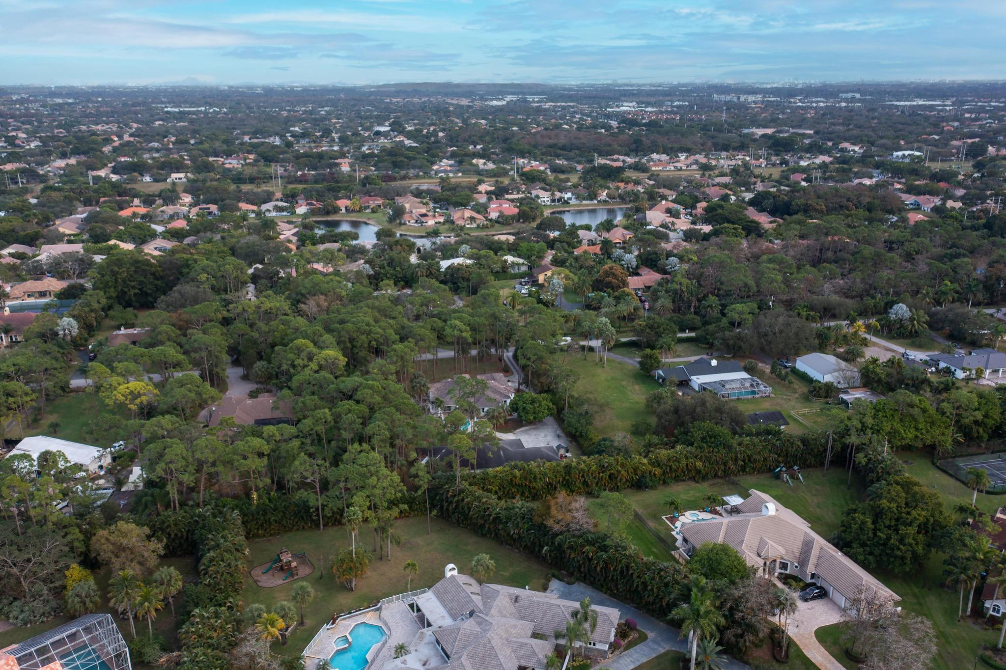 4901 Godfrey Road Parkland, FL 33067 - Photo 12 of 60 an aerial view of a city with lots of residential buildings