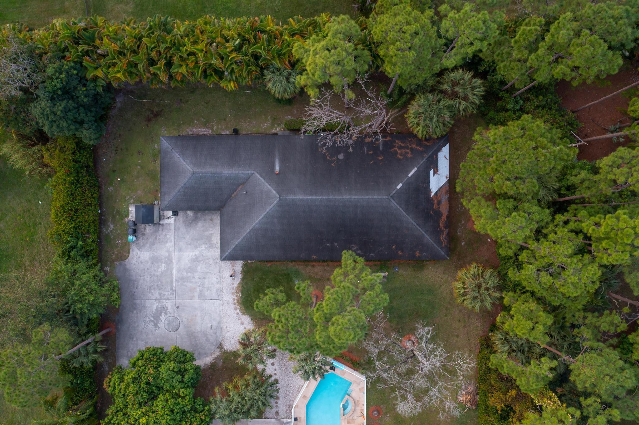 4901 Godfrey Road Parkland, FL 33067 - Photo 13 of 60 an aerial view of a house with a yard