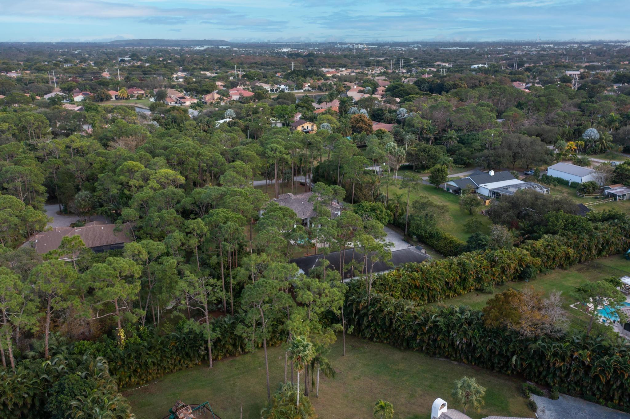 4901 Godfrey Road Parkland, FL 33067 - Photo 17 of 60 an aerial view of a houses with a yard
