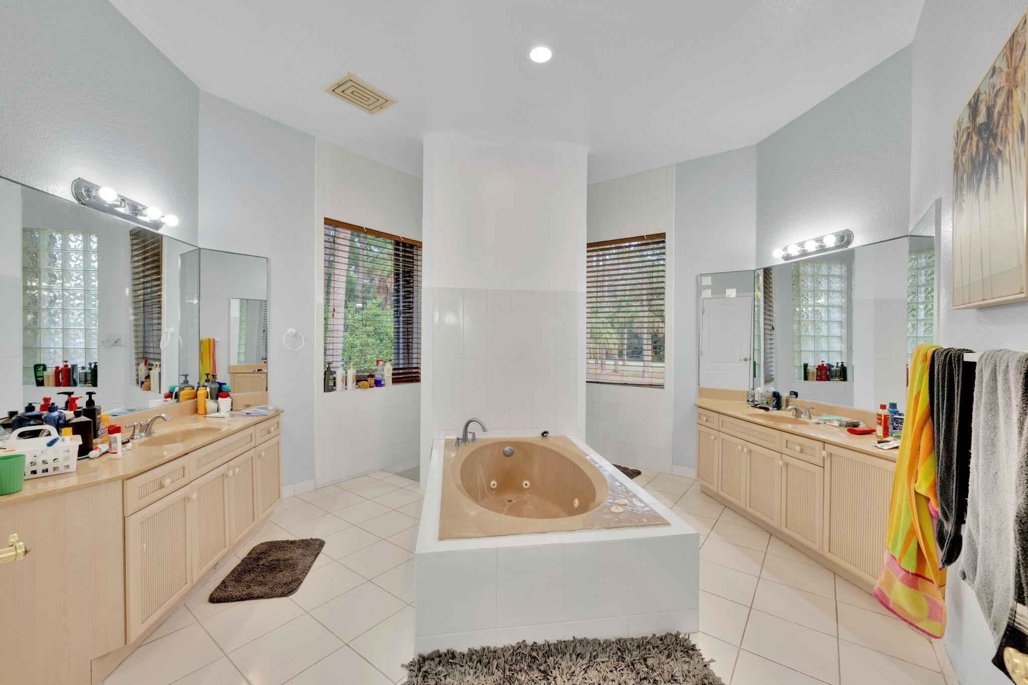 4901 Godfrey Road Parkland, FL 33067 - Photo 39 of 60 a room with furniture a flat screen tv and a window