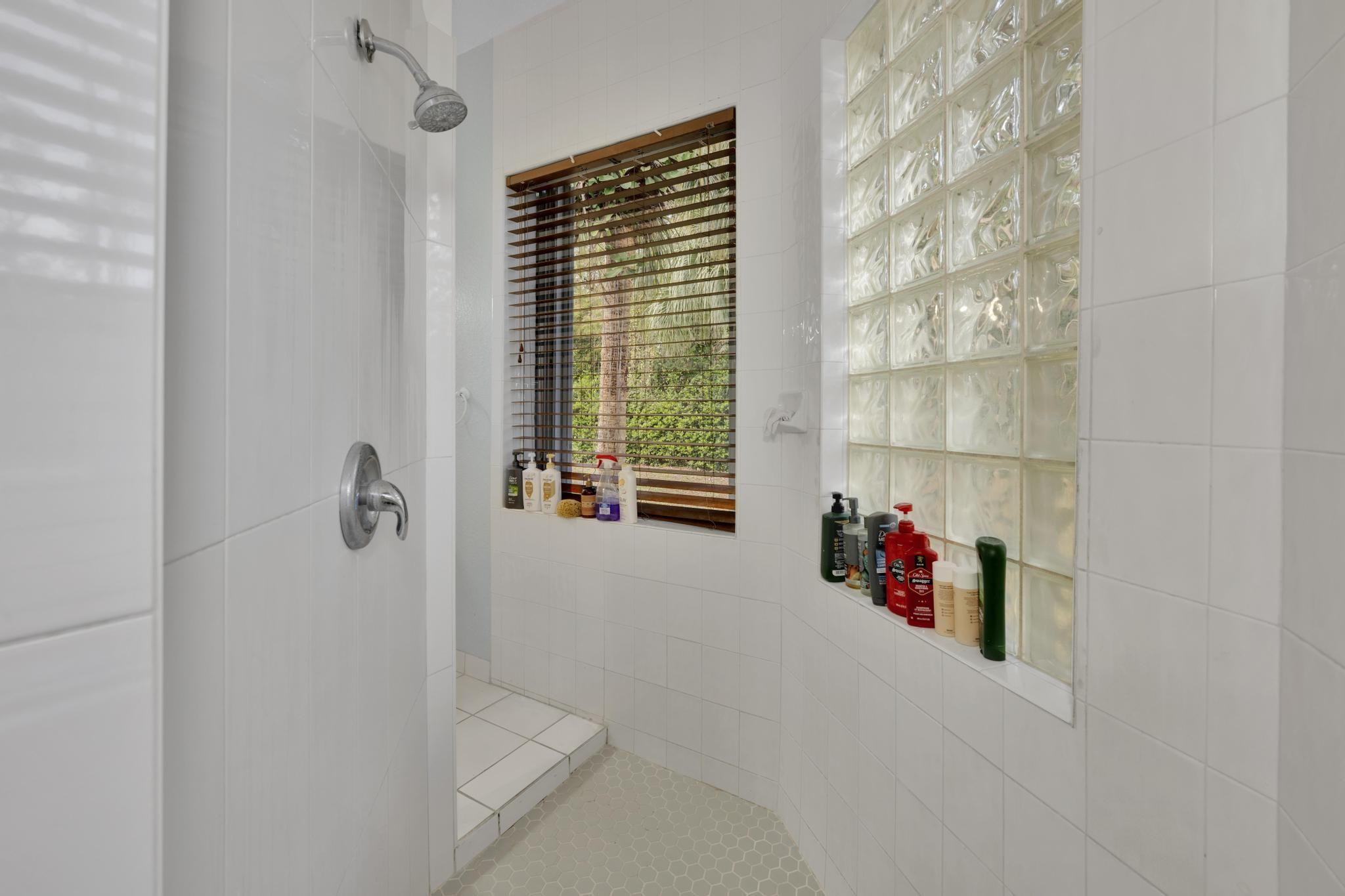 4901 Godfrey Road Parkland, FL 33067 - Photo 40 of 60 a view of entryway with a shower and a livingroom