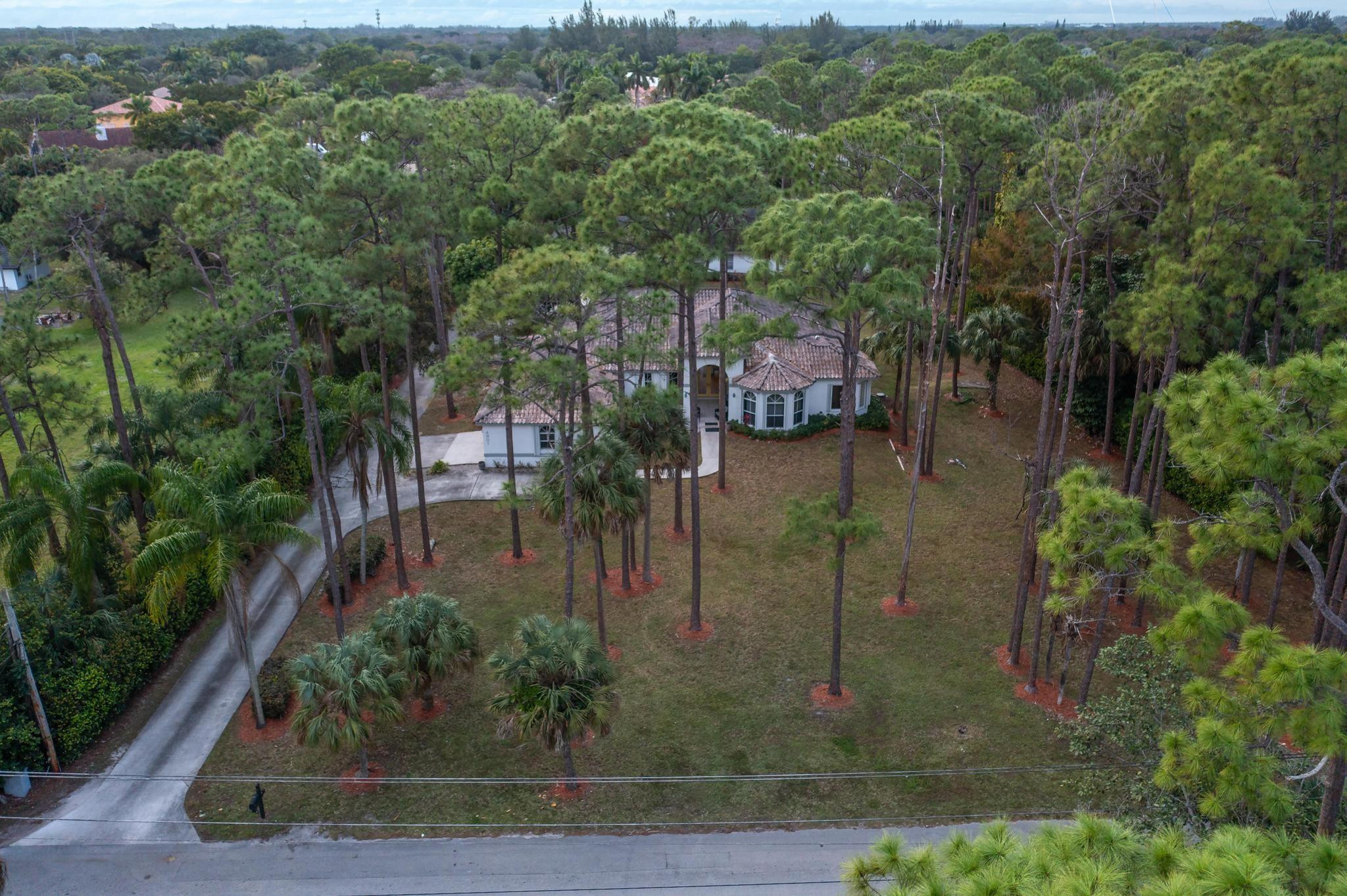 4901 Godfrey Road Parkland, FL 33067 - Photo 4 of 60 an aerial view of residential house with outdoor space
