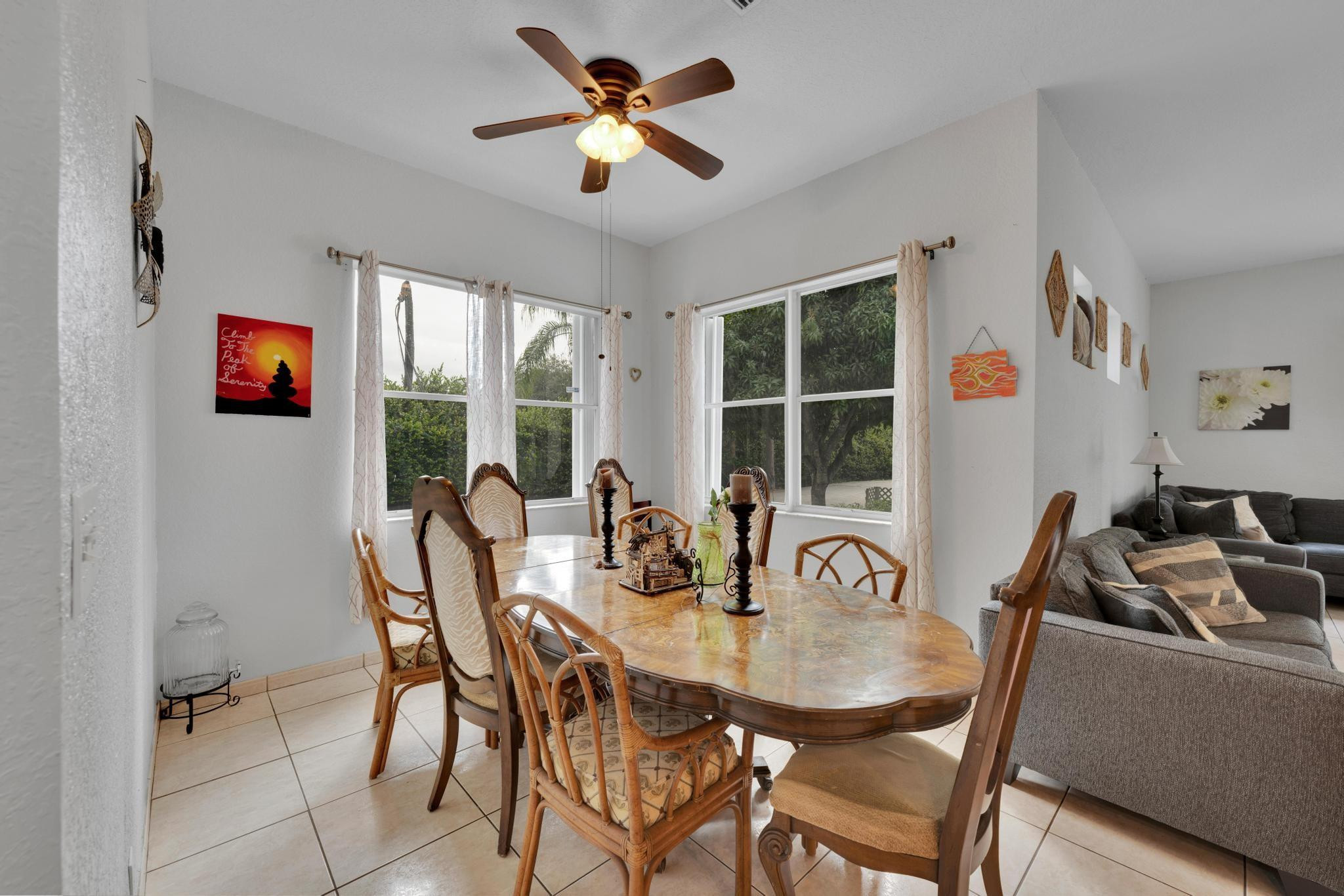 4901 Godfrey Road Parkland, FL 33067 - Photo 41 of 60 a view of a dining room with furniture window and outside view