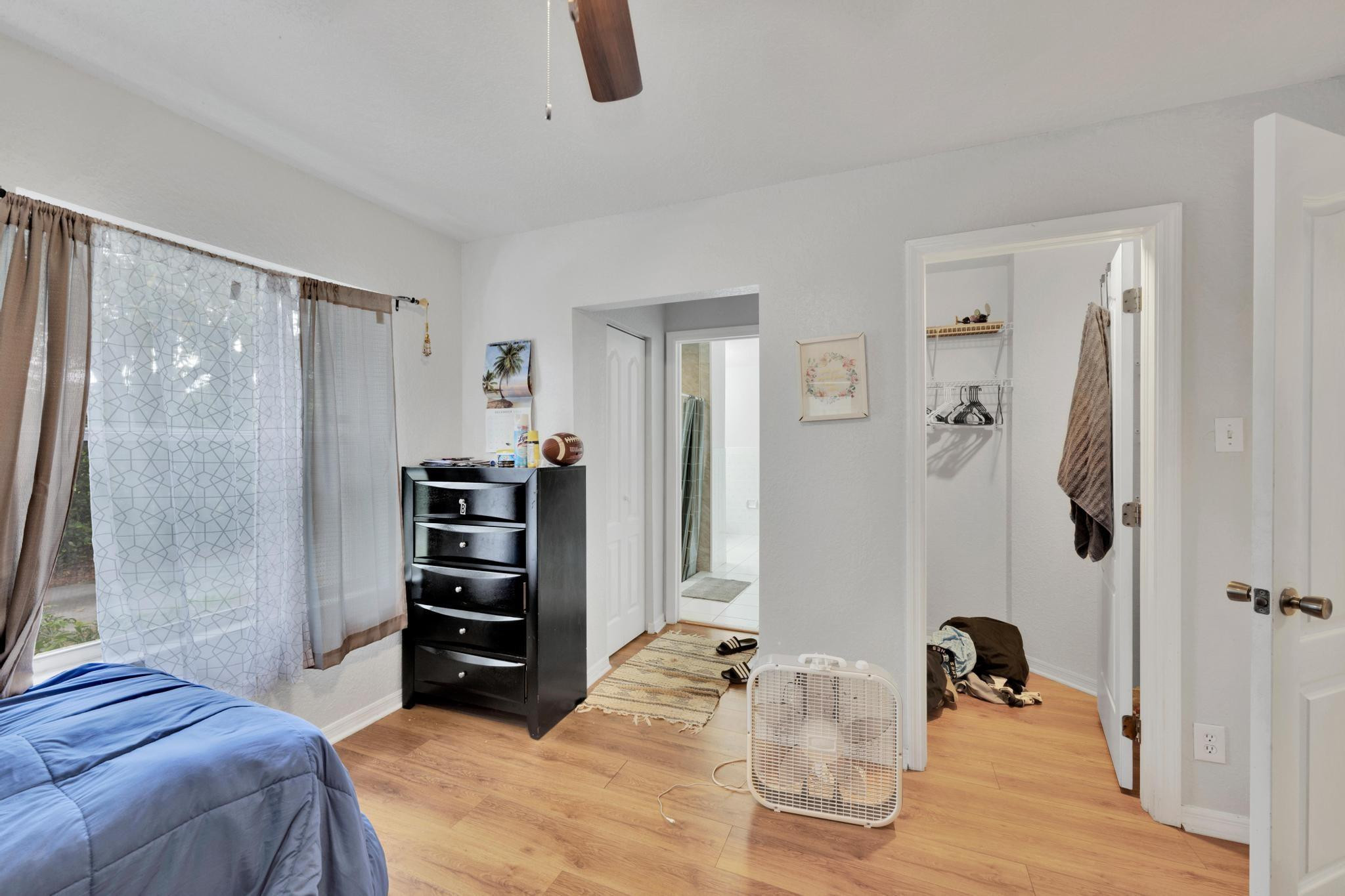 4901 Godfrey Road Parkland, FL 33067 - Photo 49 of 60 a bedroom with a bed and a closet