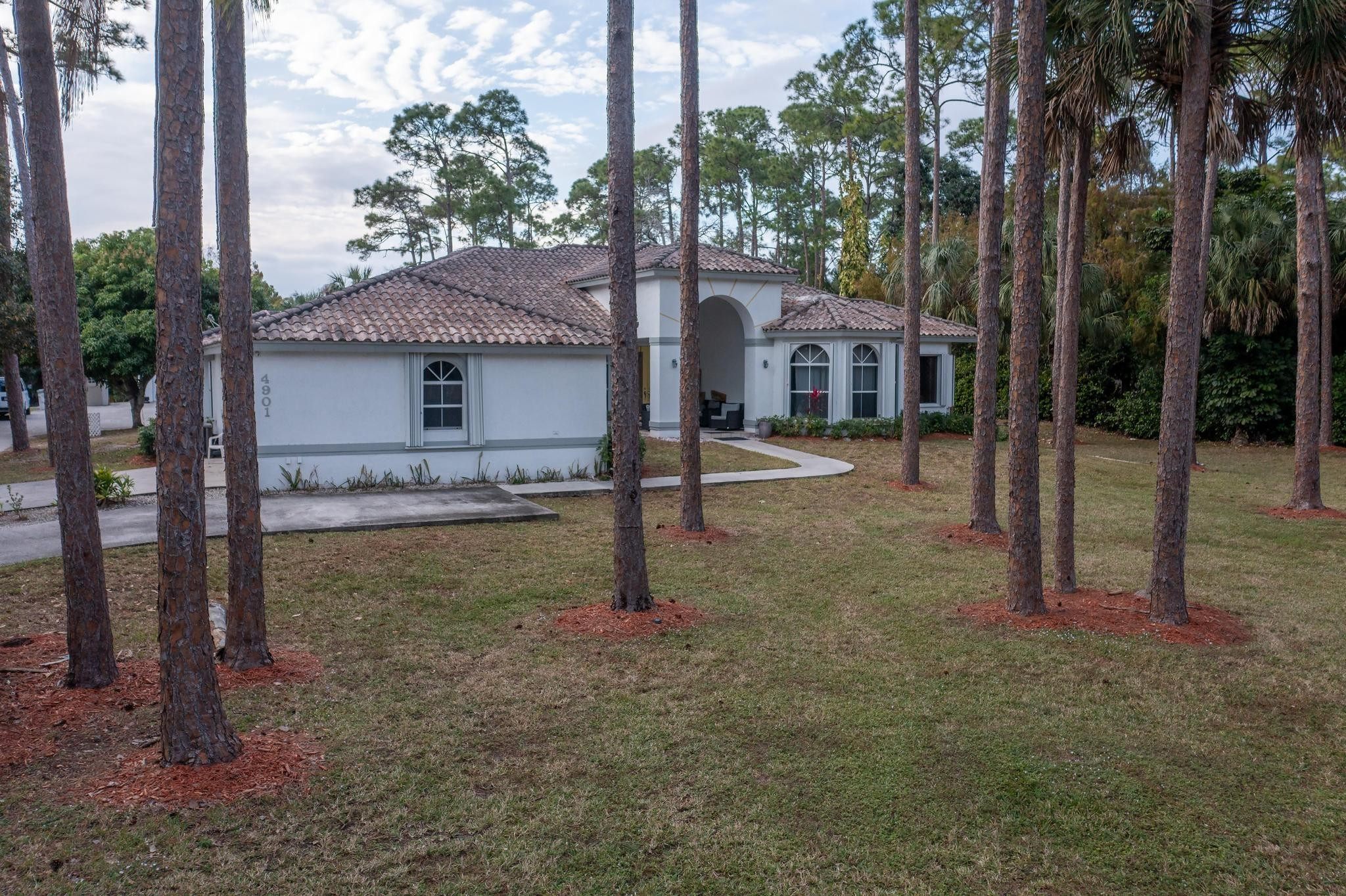 4901 Godfrey Road Parkland, FL 33067 - Photo 7 of 60 a view of a house with a backyard