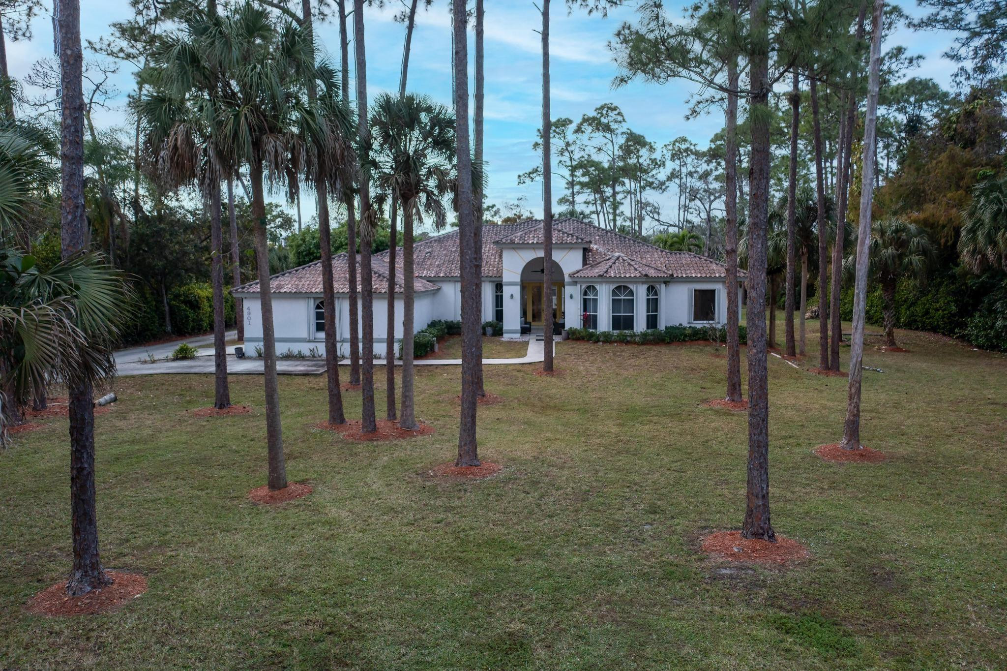 4901 Godfrey Road Parkland, FL 33067 - Photo 9 of 60 a view of a yard in front of the house