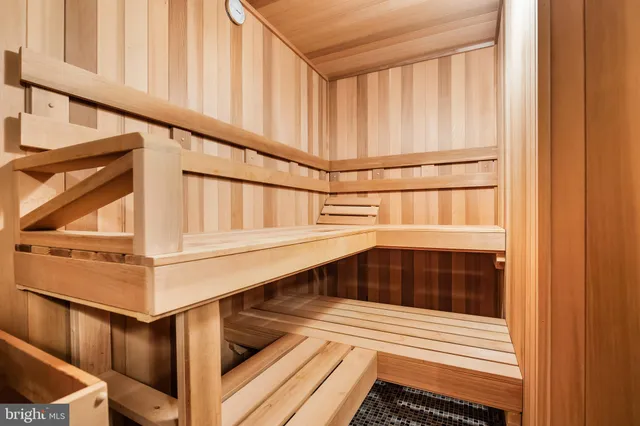 a view of a room with a table and chairs