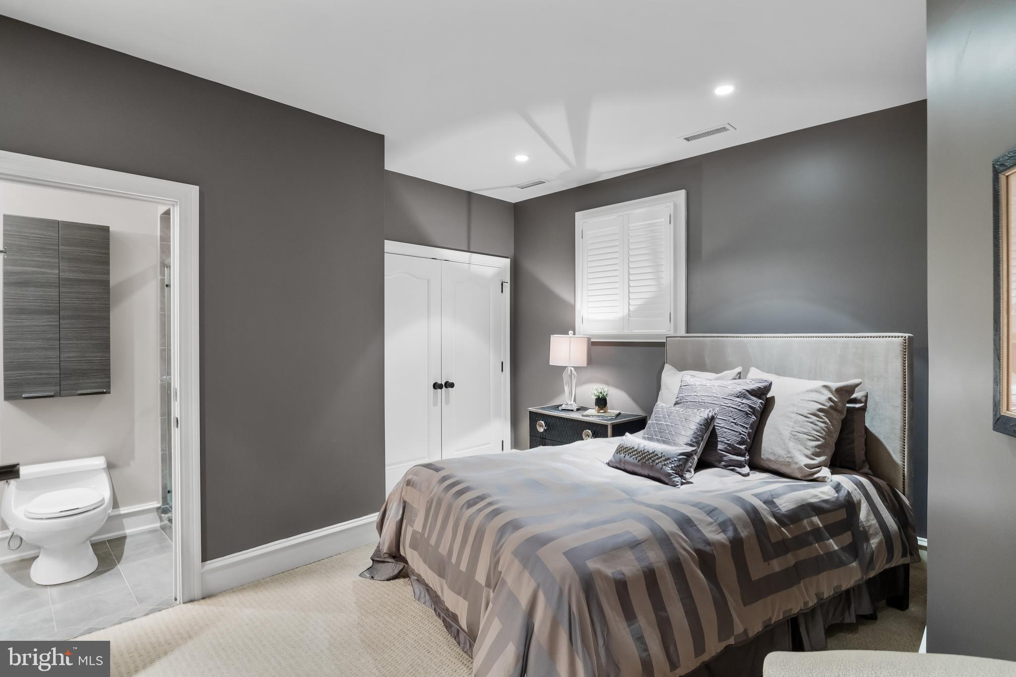 4 Southwood Drive Cherry Hill, NJ 08003 - Photo 45 of 58 a bedroom with a bed and a view of bathroom