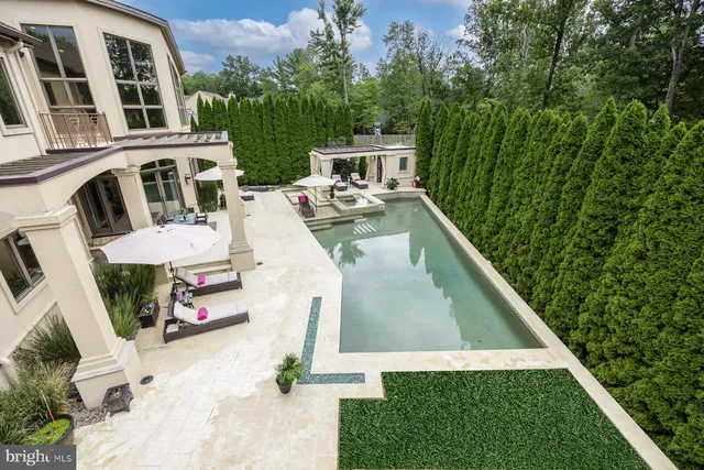 an aerial view of a house with a garden