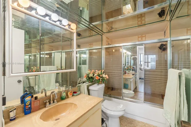 a room with sink and view of living room