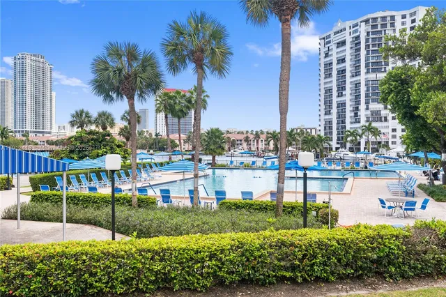 a park with lots of palm trees and plants