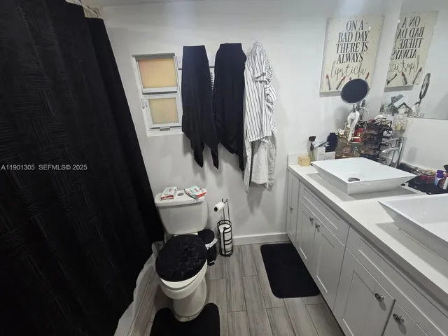 a bathroom with a sink and a toilet