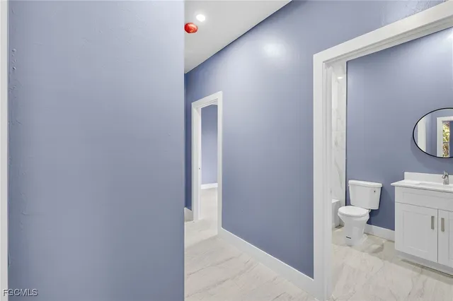 a bathroom with a toilet