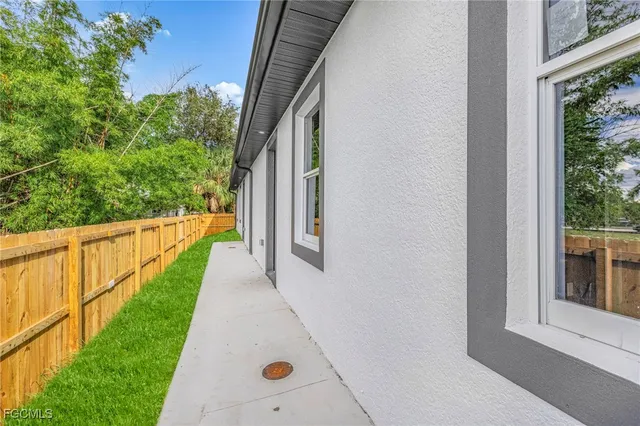 a view of a balcony with wooden floor
