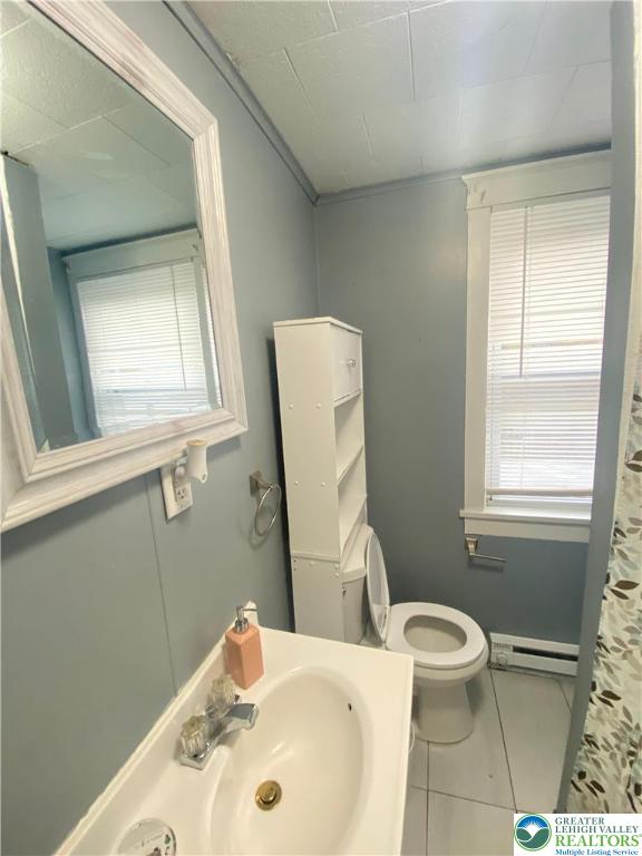 37 Hunter Street Tamaqua, PA 18252 - Photo 18 of 30 a bathroom with a sink a toilet and window