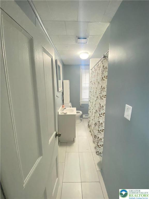 37 Hunter Street Tamaqua, PA 18252 - Photo 20 of 30 a bathroom with a sink a toilet a mirror and shower