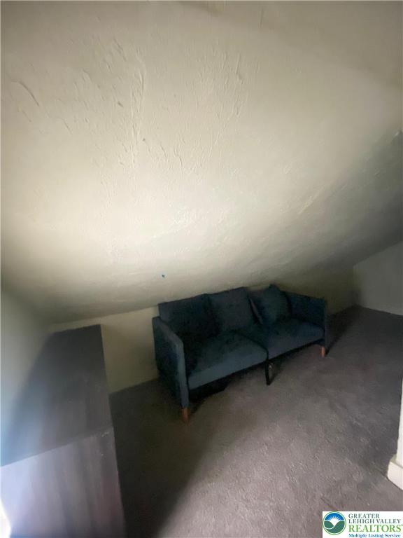 37 Hunter Street Tamaqua, PA 18252 - Photo 29 of 30 a couch sitting in a room next to a window