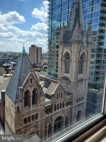 a aerial view of a house with a iron gate