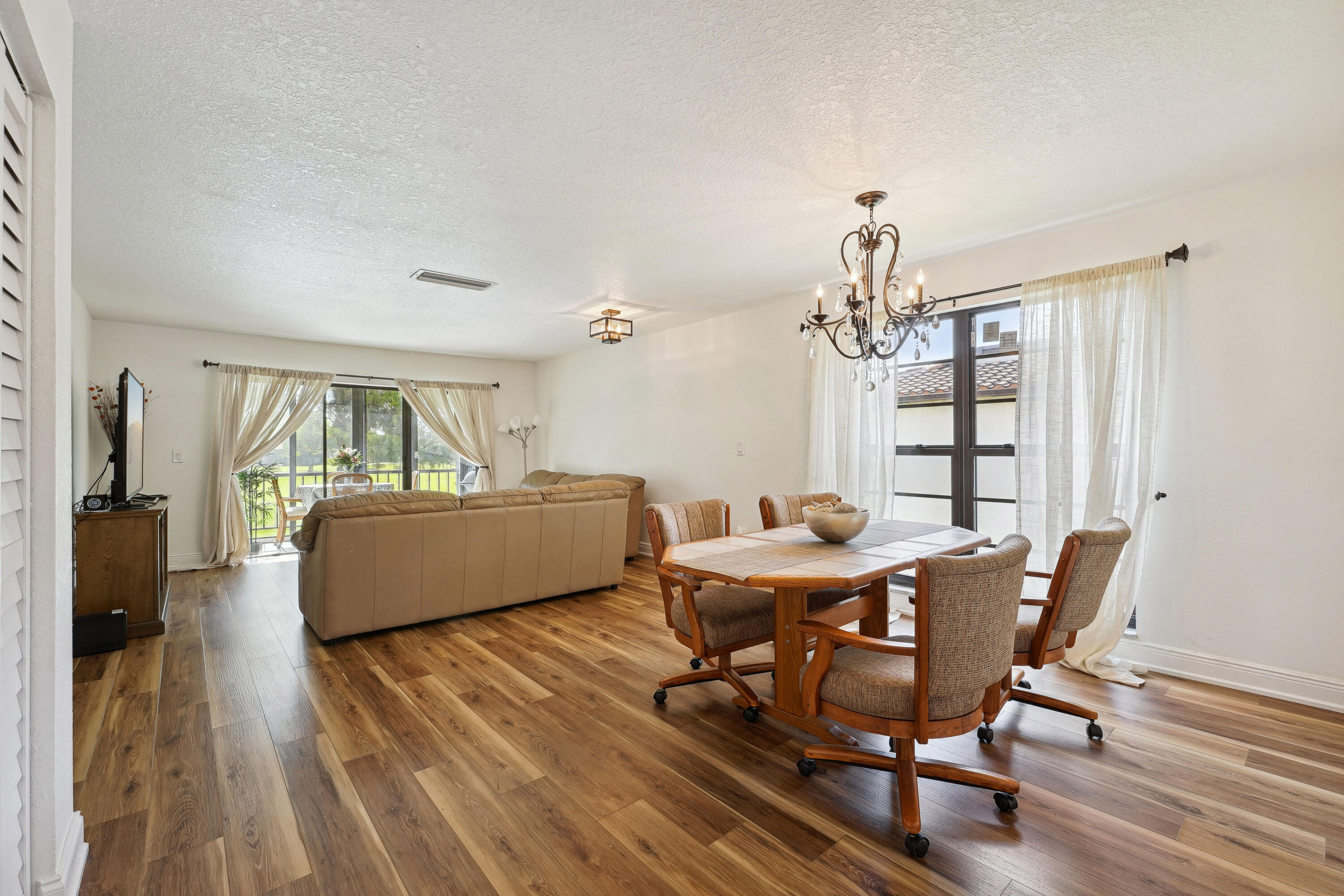 21650 Juego Circle, Unit 24B Boca Raton, FL 33433 - Photo 12 of 21 livingroom/diningroom