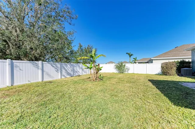 a view of swimming pool with a lounge chair