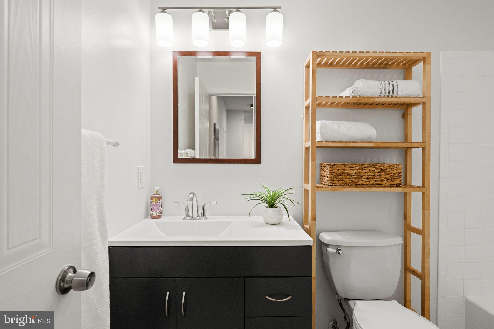 2000 16th Street Northwest, Unit 302 Washington, DC 20009 - Photo 23 of 36 Updated bathroom