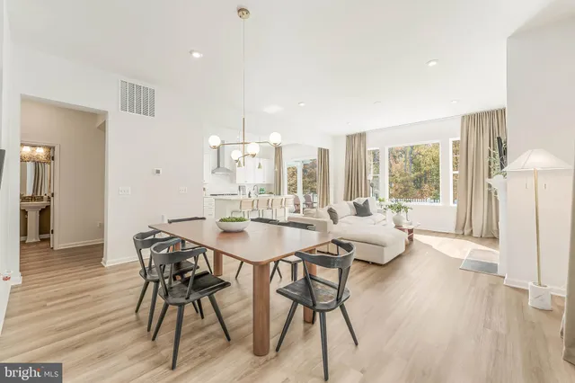 a en suite bathroom with a double vanity sink a mirror and a shower