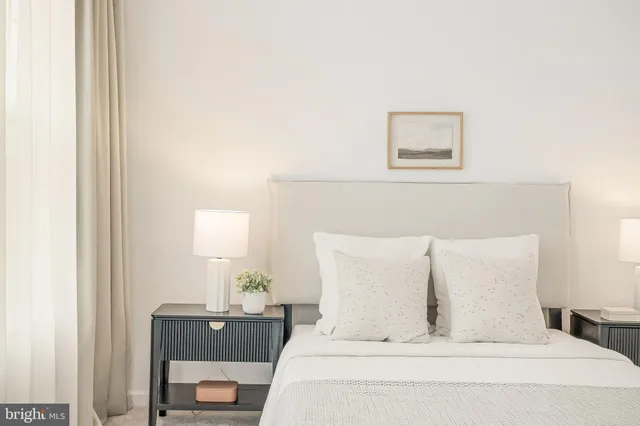 a front view of a house with a yard table and chairs