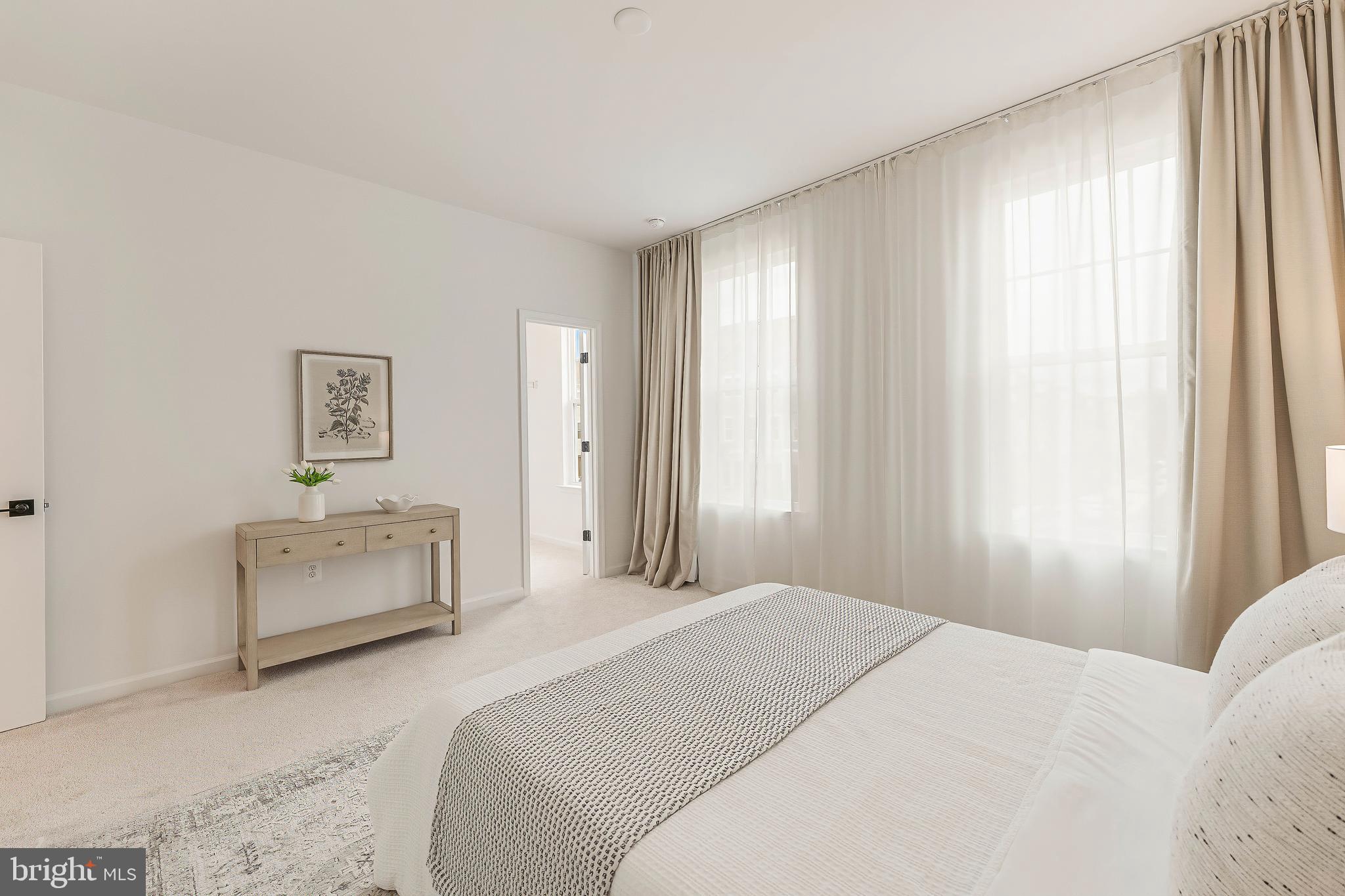 18260 Moss Garden Road Dumfries, VA 22026 - Photo 42 of 97 a bedroom with a bed and a window