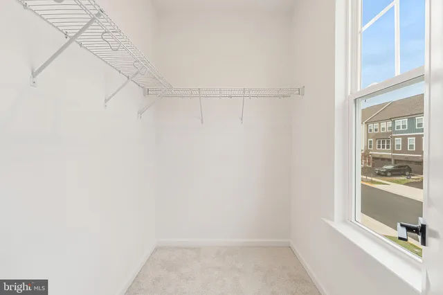 an aerial view of residential building with parking space