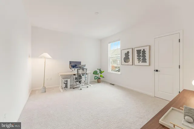 a view of a street with houses