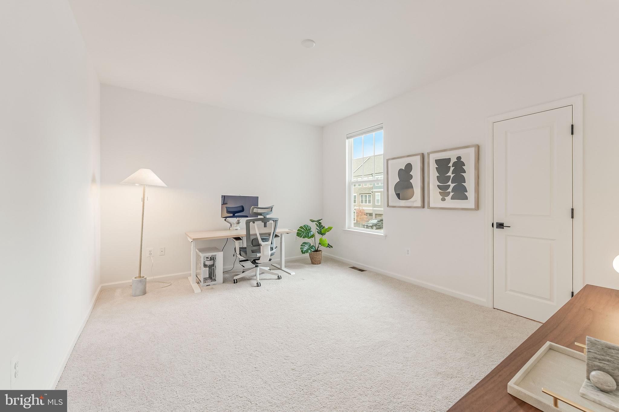 18260 Moss Garden Road Dumfries, VA 22026 - Photo 45 of 97 a room with furniture and a window