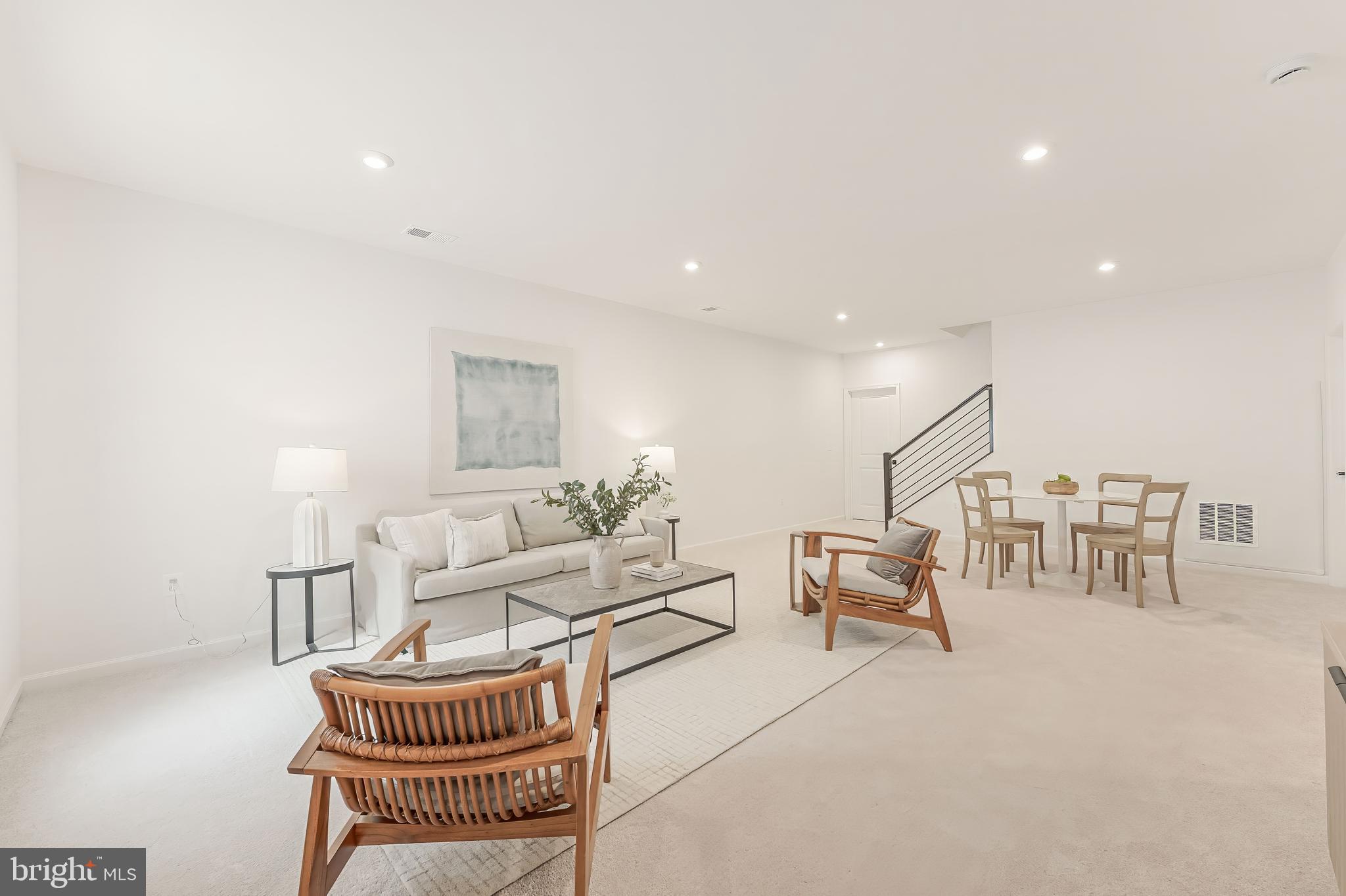 18260 Moss Garden Road Dumfries, VA 22026 - Photo 58 of 97 a living room with furniture and a table