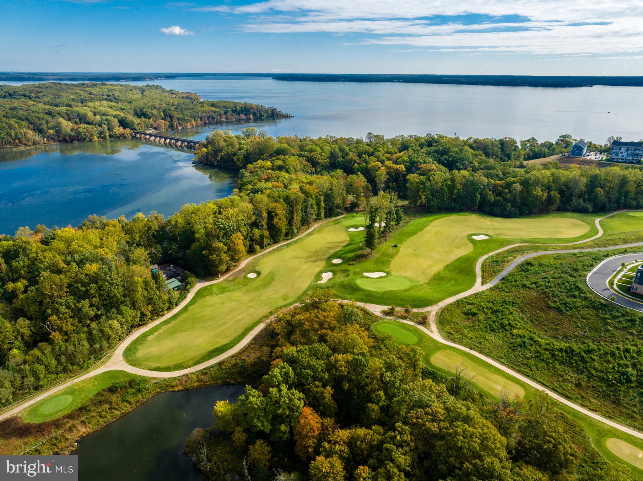 18260 Moss Garden Road Dumfries, VA 22026 - Photo 89 of 97 a view of a swimming pool and an ocean view