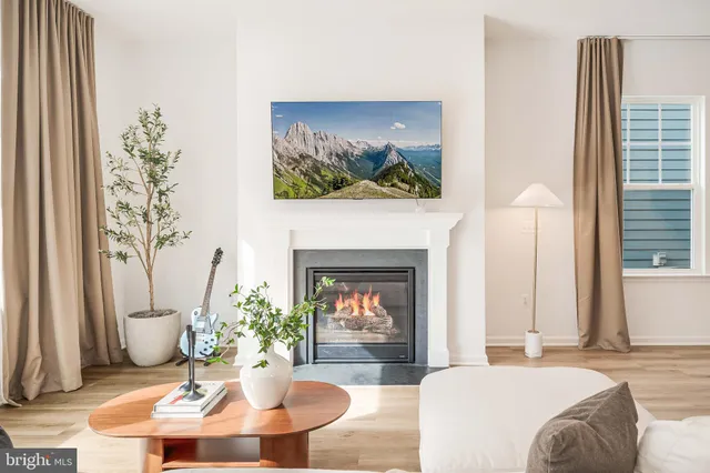 a bathroom with a sink mirror toilet and a shower