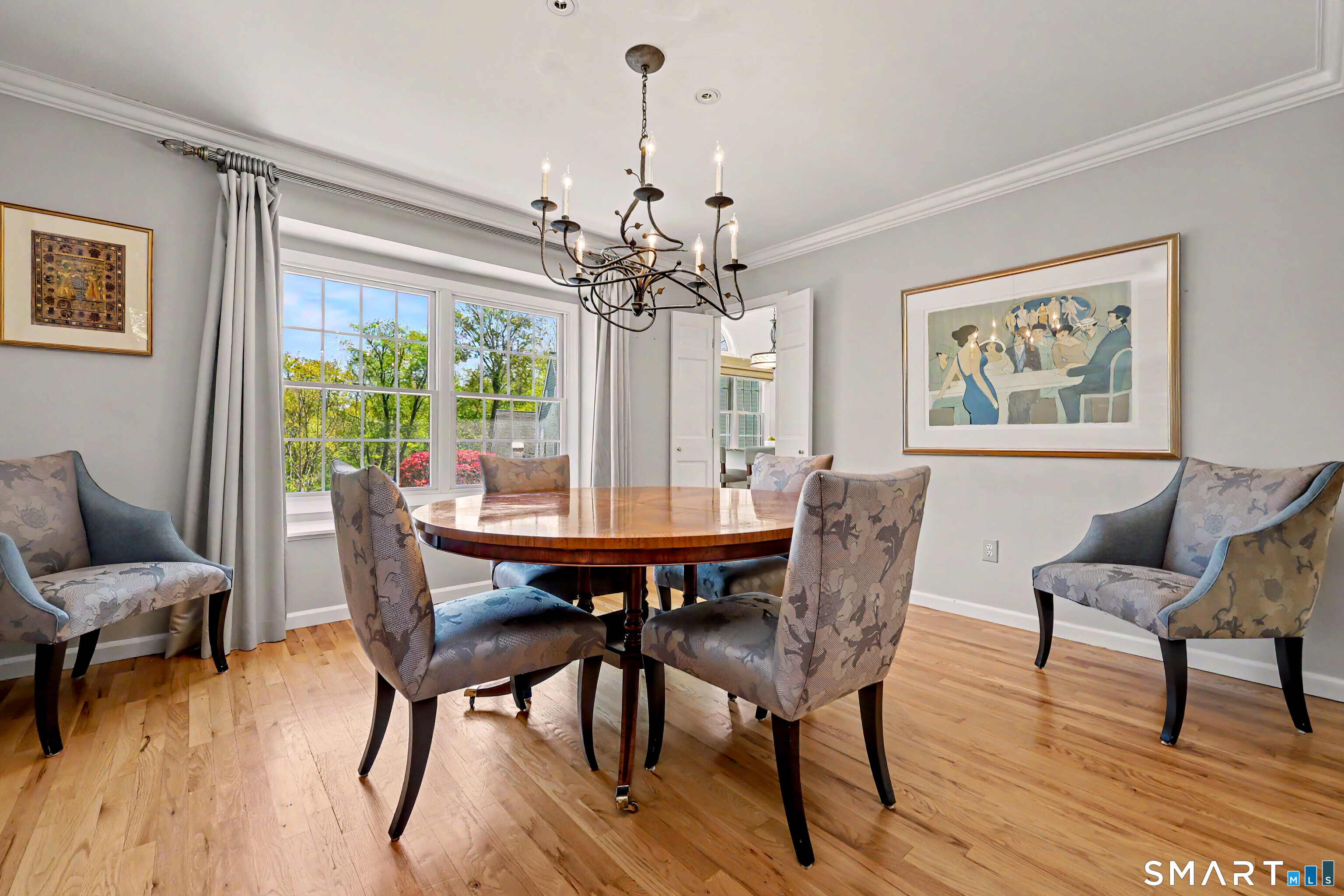120 Prospect Street, Unit 46 Ridgefield, CT 06877 - Photo 11 of 36 a view of a dining room with furniture window and wooden floor