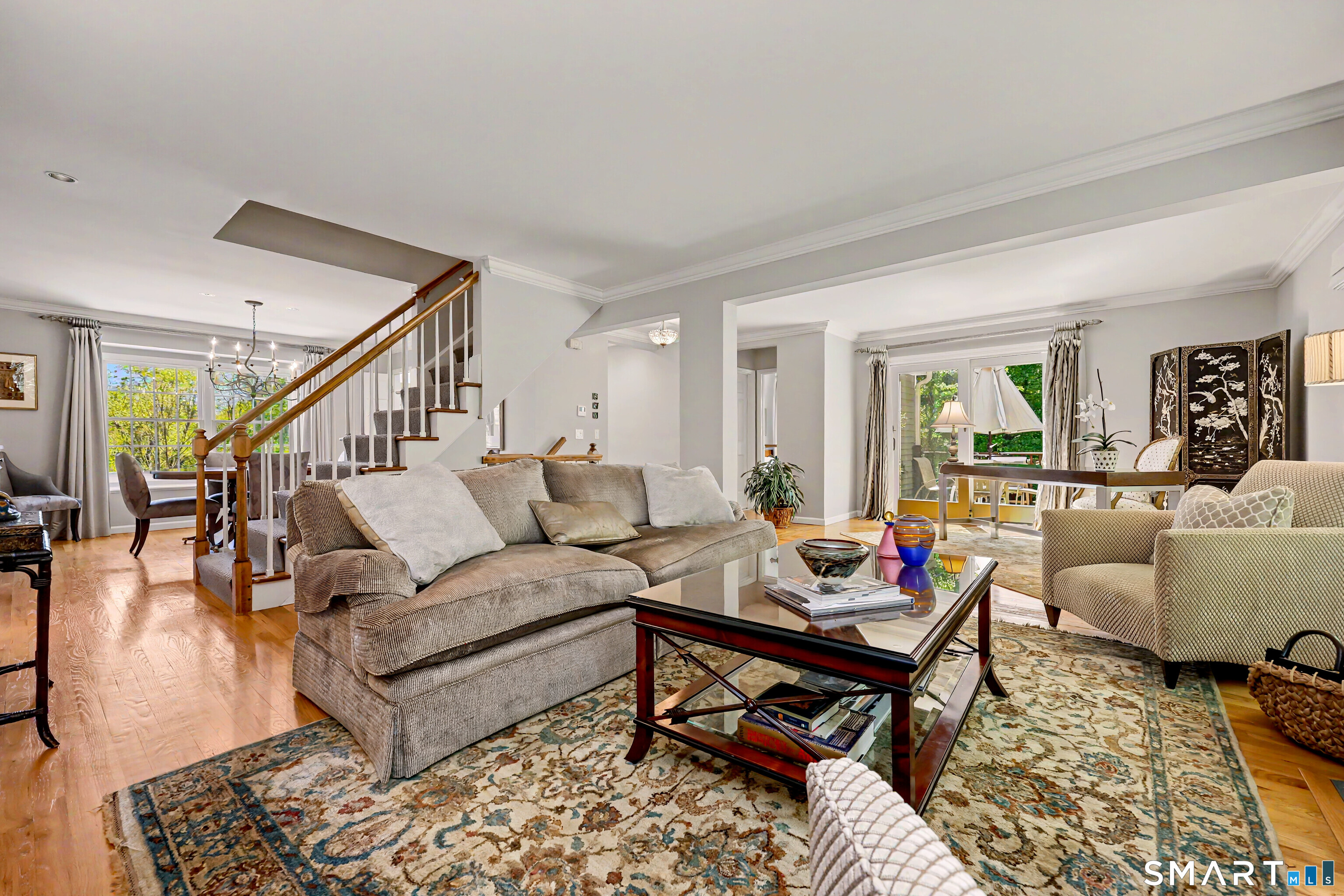 120 Prospect Street, Unit 46 Ridgefield, CT 06877 - Photo 23 of 36 a living room with furniture wooden floor and a table