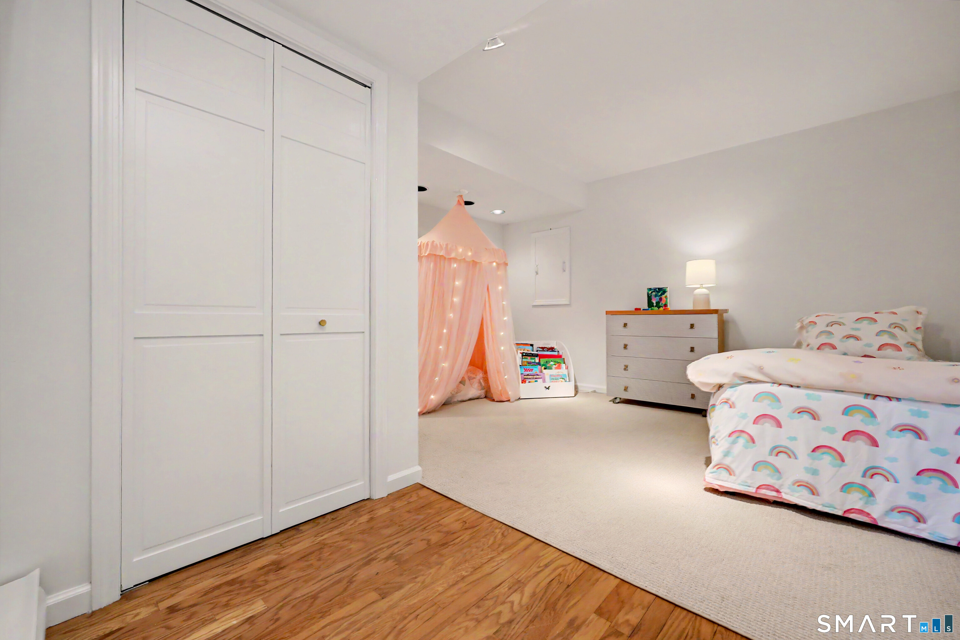 120 Prospect Street, Unit 46 Ridgefield, CT 06877 - Photo 28 of 36 a bedroom with a bed and a window