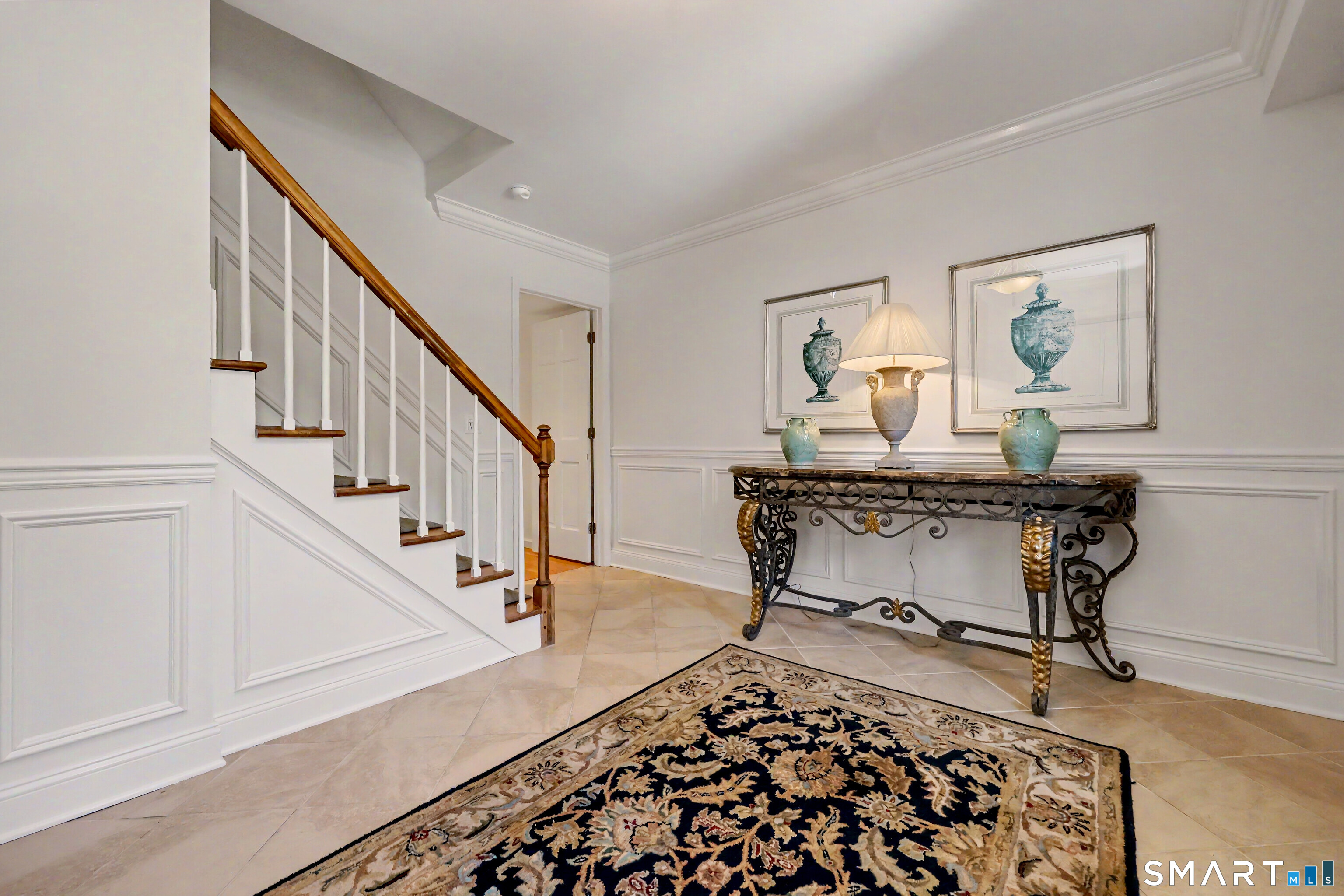 120 Prospect Street, Unit 46 Ridgefield, CT 06877 - Photo 5 of 36 a room with table soccer and a rug