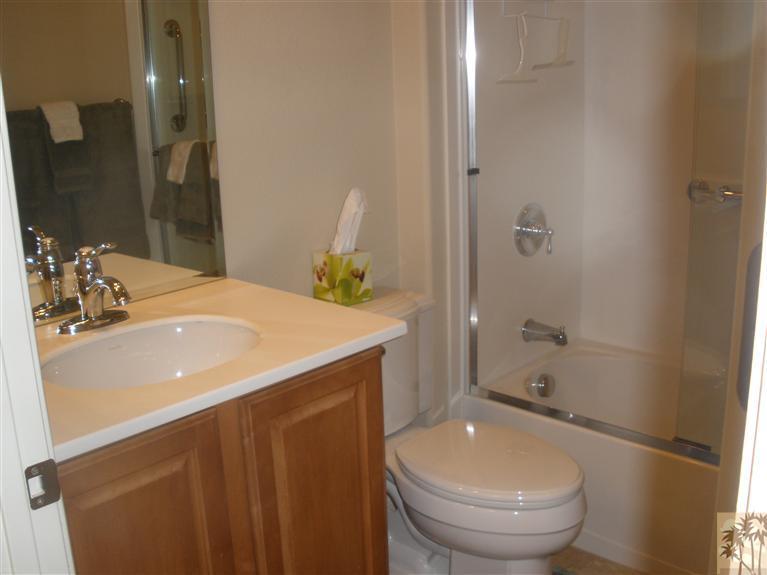 81673 Avenida Alturas Indio, CA 92203 - Photo 11 of 17 a bathroom with a sink a toilet and shower