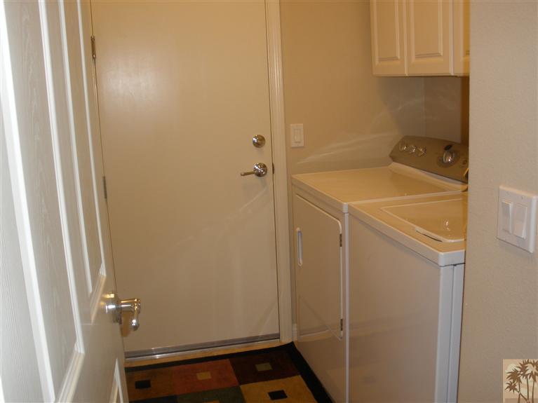 81673 Avenida Alturas Indio, CA 92203 - Photo 13 of 17 a bathroom with a sink and washing machine