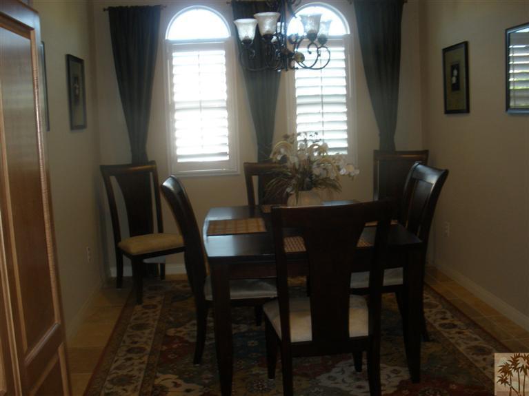 81673 Avenida Alturas Indio, CA 92203 - Photo 5 of 17 a dining room with furniture and window