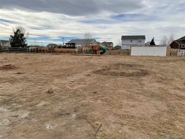 a view of a terrace with chairs