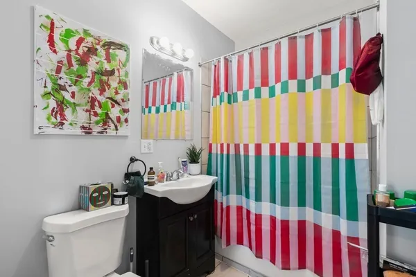 a bathroom with a sink toilet and a bathtub